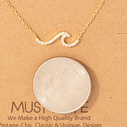 Pave Wave Pendant Necklace: Gold