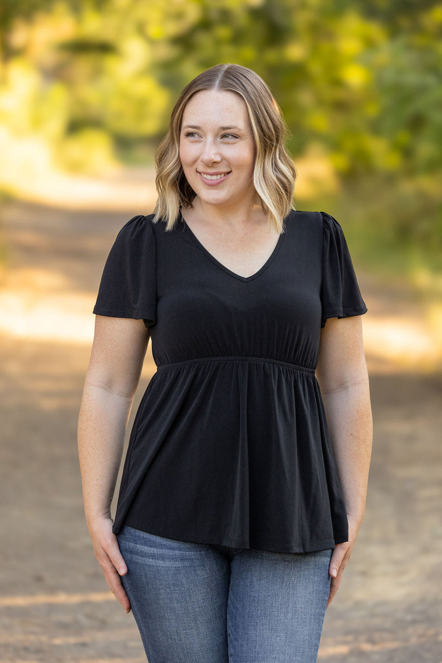 emery ruffle top black short sleeve womens top